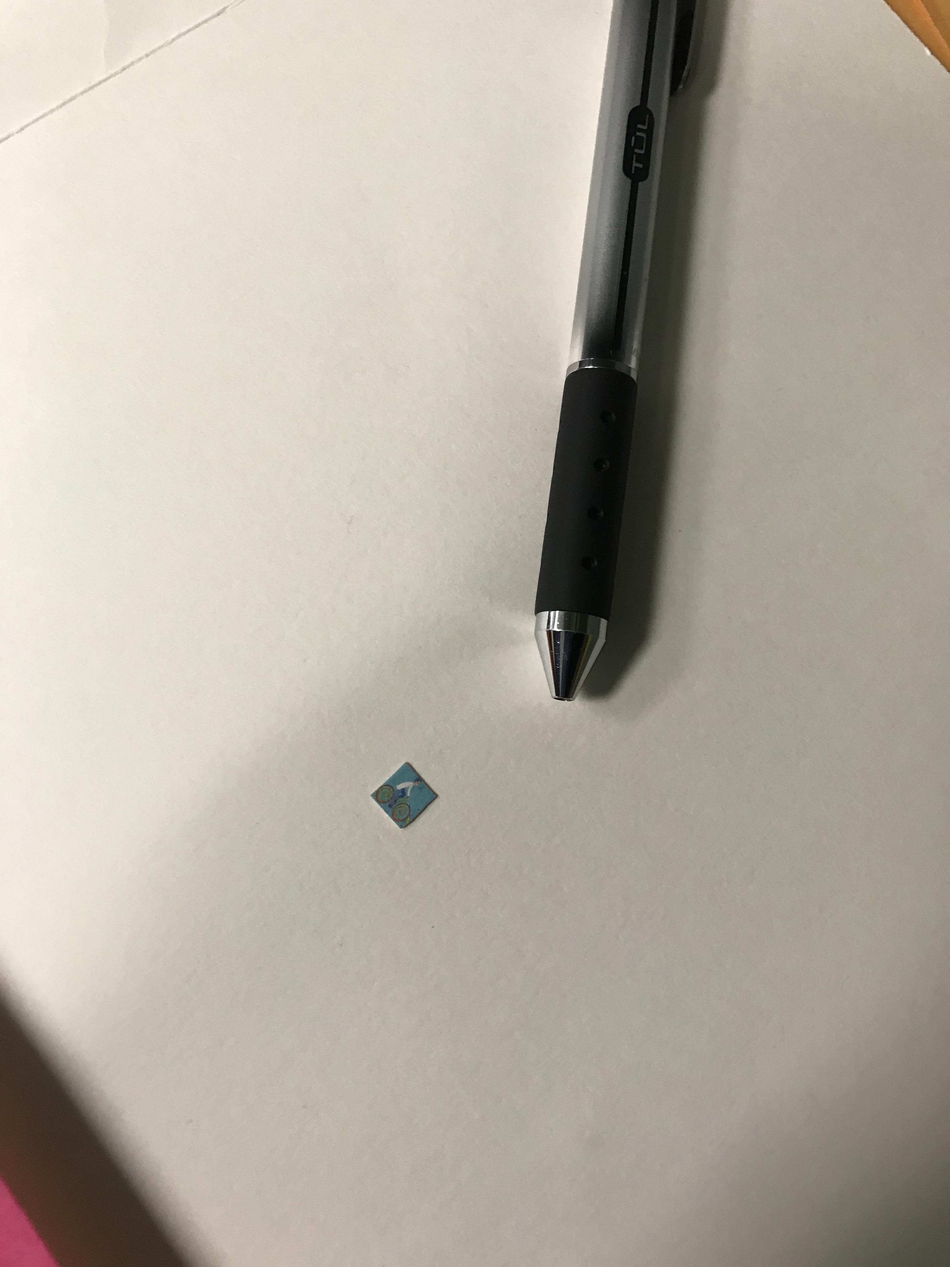 tab with pen next to it